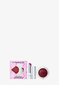 MAC cosmetics set featuring a pink box with a diamond pattern, a silver lipstick tube with a bright pink bullet, and a round dark red cream blush.