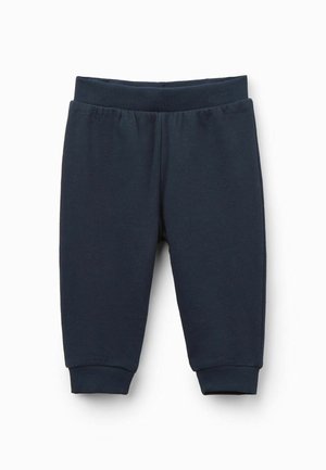Marineblaue Sweatpants mit einem gerippten elastischen Bund und Knöchelbündchen; weicher Baumwollstoff mit glatter Textur und schlichtem Design.