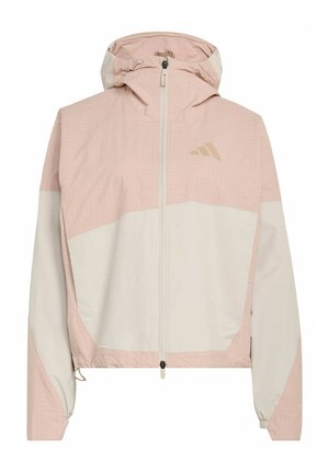 Giacca a vento rosa e bianca con motivo a scacchi nella sezione superiore, dotata di zip frontale e cappuccio regolabile.