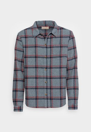 Button-up flannel shirt in blue with red and navy plaid pattern, crafted from soft fabric, featuring a collar and long sleeves.