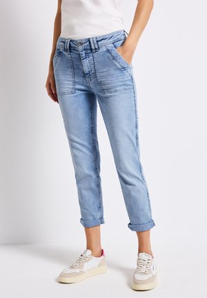 - Jeansy Slim Fit