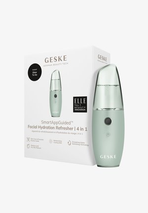 Ansigtsfugtighedsforfrisker i mintgrøn, med en transparent top, rundet design, sort knap og elegant emballage med brandtekst.