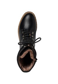 Black leather boot with a round toe, gold eyelets, and black laces. Features a soft brown fur lining and a textured brown rubber sole.