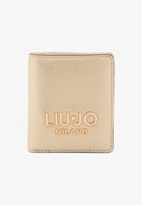 Geselecteerd, gold-coloured