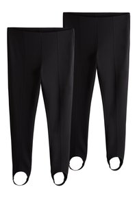 Mustad venivast materjalist retuusid, millel on kehale mugavalt sobiv lõige, vöökohad ning pahkluude juures ümarad avad lisatud detaili jaoks.