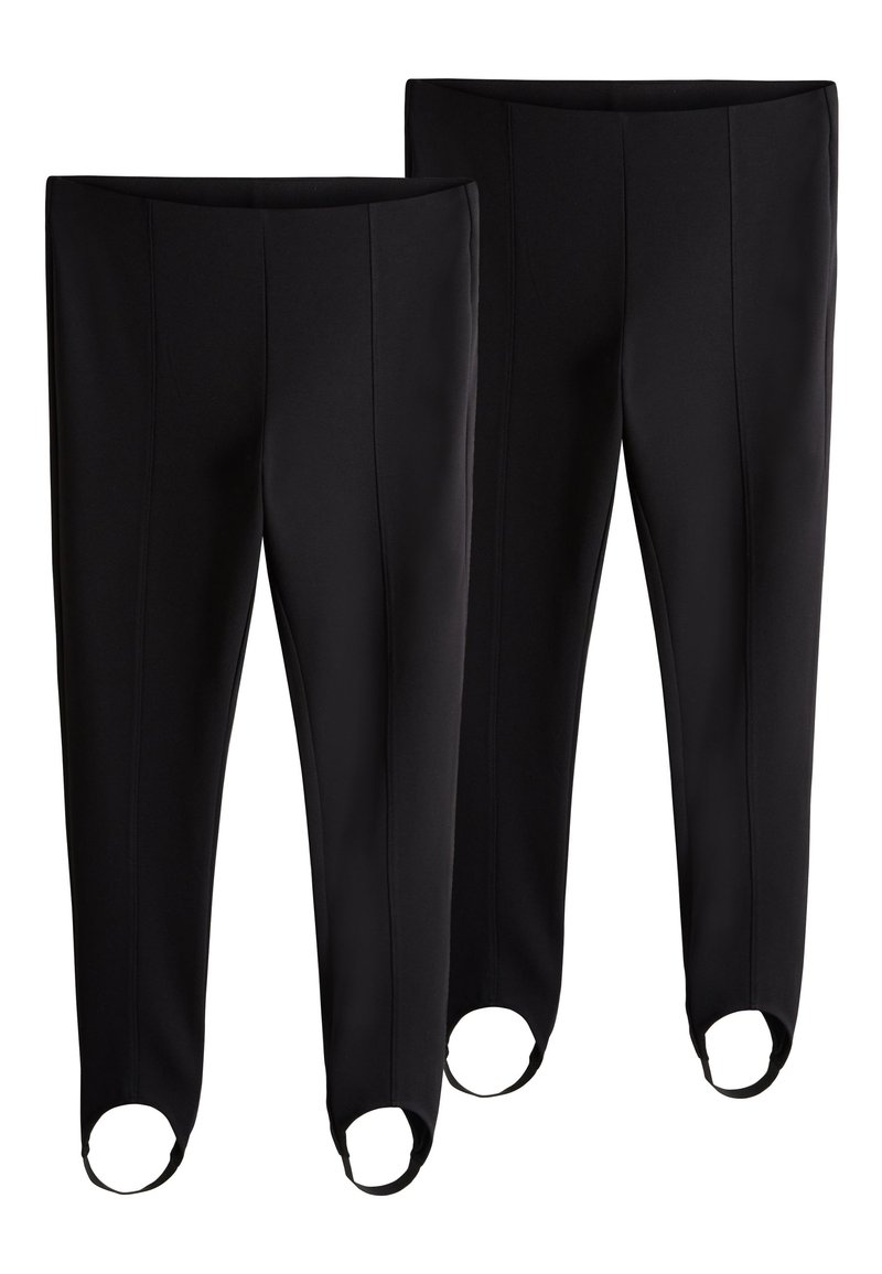 Mustad venivast materjalist retuusid, millel on kehale mugavalt sobiv lõige, vöökohad ning pahkluude juures ümarad avad lisatud detaili jaoks.