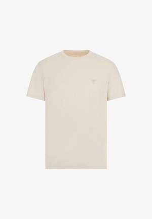 Tricou bej cu mânecă scurtă, confectionat dintr-un material moale, având un mic logo triunghiular embosat pe partea stângă a pieptului. Textură netedă.