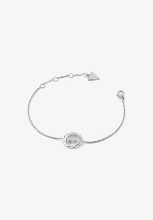 Braccialetto in argento con charm circolare decorato con rhinestones, finitura liscia e un'etichetta triangolare con chiusura a moschettone.