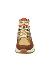 Brown suede and beige canvas hiking boot with white laces and gold hardware. Features a cushioned collar and a textured rubber sole.