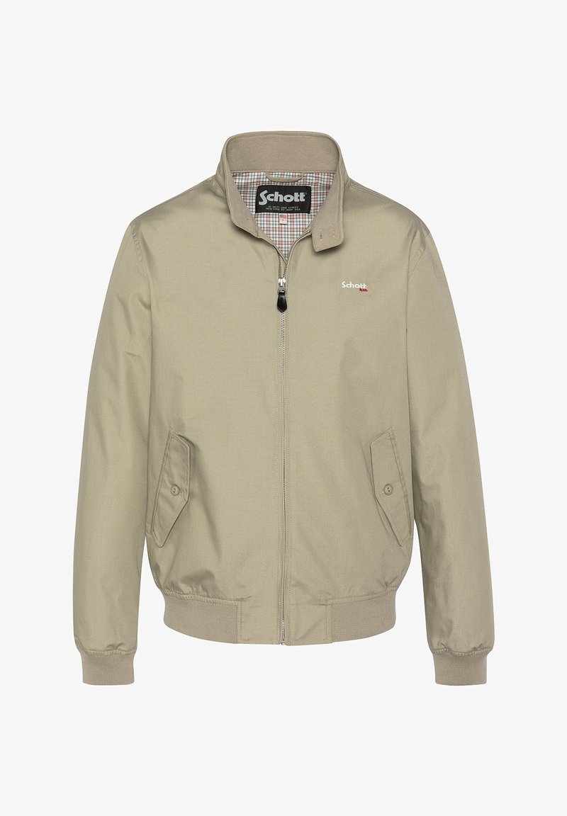 Beige bomberjakke med lynlås foran, to sidelommer, ribbede manchetter og ternet foring. Har et lille broderet logo på brystet.
