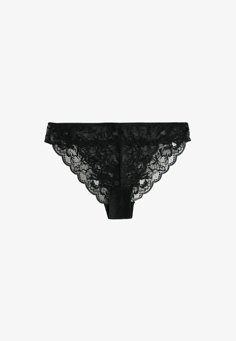Sort blonde tanga med blomsterprint, bølgende kanter og en glat linning. Har et solidt panel midt bagpå.