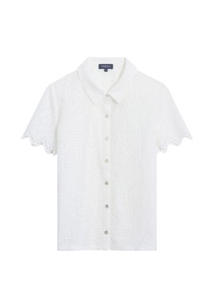Chemise blanche à manches courtes boutonnée avec des motifs ajourés brodés et un col pointu.