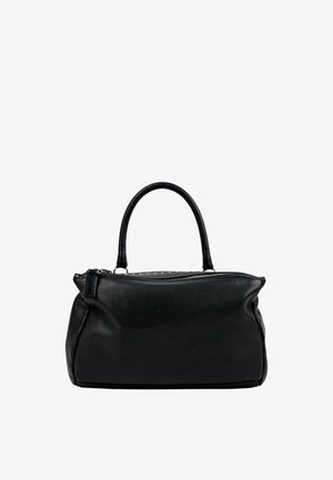Sac à main en cuir noir avec une seule poignée supérieure et une fermeture éclair, exposé sur un fond blanc.