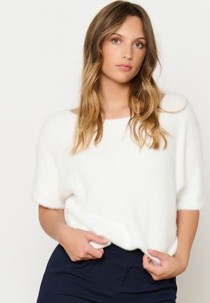White, short-sleeved sweater made of soft, textured knit fabric with a wide, rounded neckline; relaxed fit with a slightly cropped hem.