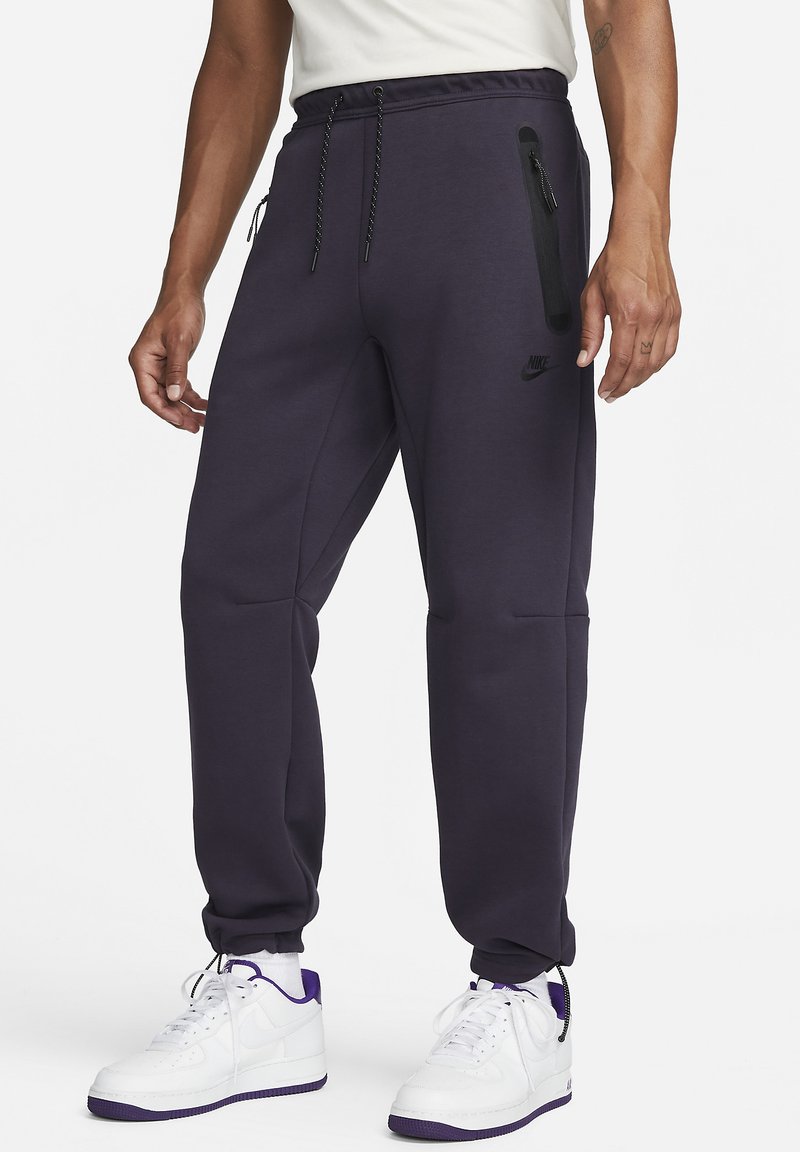 Nike Sportswear Tracksuit bottoms cave purple/black/purple Zalando.ie