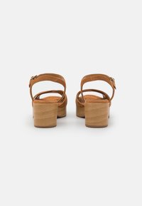 Unisa IRAM - Clogs - toffee