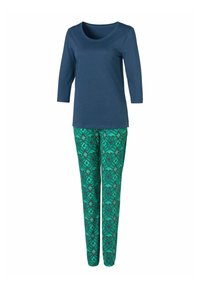 Navy three-quarter sleeve top paired with green patterned pants featuring a geometric design and accents in red and blue.