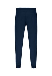 Pantaloni della tuta blu navy con una texture morbida, vita elastica e polsini a costine. Il design è affusolato con cuciture minime visibili.