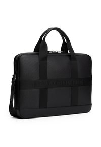 Black laptop bag with a textured finish, featuring top handles, a shoulder strap, and a prominent logo band on the front.