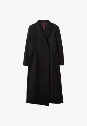 Lungo cappotto in lana nera con revers, chiusura frontale nascosta e tasche con fessura, progettato per il freddo.