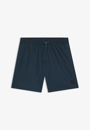 Men's dark blue swim shorts with a subtle geometric pattern, elastic waistband, drawstring, and a small black logo patch on the leg.