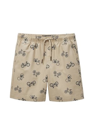 Short beige avec taille élastique et cordon, décoré d'un motif de petits vélos noirs sur toute la surface.