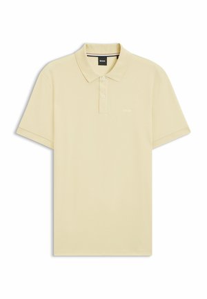 Beige short-sleeve polo shirt with two buttons, a collar, and small "BOSS" logo on the left chest.
