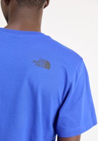 The North Face M SS FINE TEE - Majica kratkih rukava s printom - blue/black