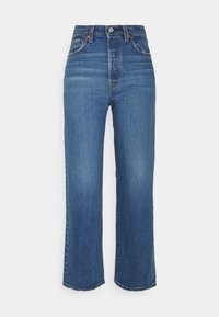 Hoge taille blauwe denim jeans met een recht gesneden pasvorm. Beschikt over vijf zakken, een knoopsluiting en subtiele stiksels langs de naden.