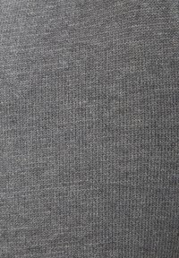 Gray knit fabric with a ribbed texture, featuring a subtle pattern. The material has a soft, flexible quality suitable for clothing.