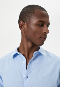 Koton CLASSIC - Camisa - blue