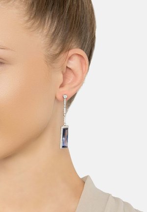 Dangling earrings featuring a rectangular blue stone framed in silver with clear accents, showcasing a sleek and modern design.