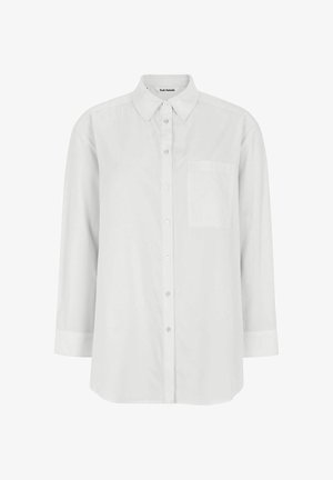 Chemise blanche à boutons, en coton, avec un col plat, des manches longues, une poche poitrine unique et un ourlet droit. Texture lisse.