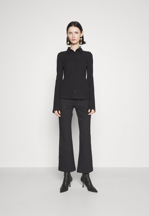 FLARED TROUSERS - Trousers3