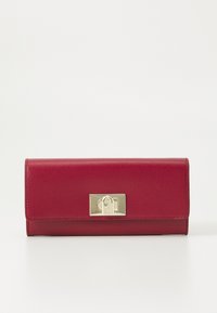 Portefeuille en cuir rouge avec une finition texturée, doté d'un fermoir en métal doré et d'une forme rectangulaire. Design minimaliste sans motifs visibles.