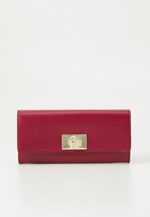 Red leather wallet with a textured finish, featuring a gold metal clasp and a rectangular shape. Minimalistic design with no visible patterns.