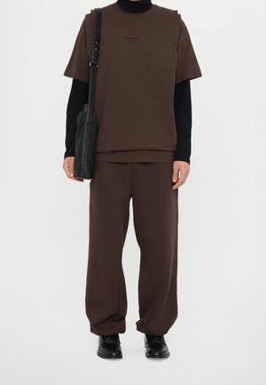 Han Kjøbenhavn, Pantalon de survêtement - dark brown