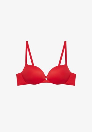 Rode gewatteerde beha met verstelbare bandjes en een kleine centrale haak, vlak weergegeven op een witte achtergrond.