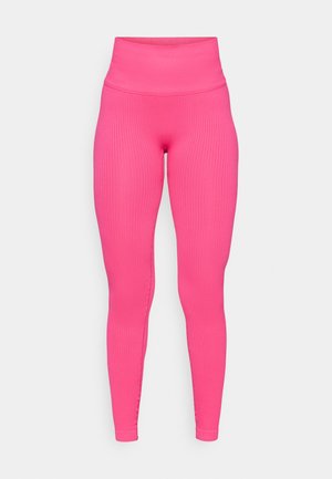 Ribbed pink leggings with a high waist, featuring a snug fit and smooth texture. The design emphasizes a sleek silhouette.
