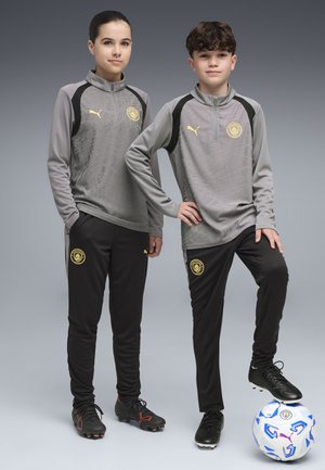Puma, MANCHESTER CITY TRAININGSHOSE UNISEX - Vereinsmannschaften - black-cast iron