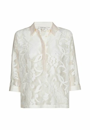 Wit kanten shirt met een kraag, driekwart mouwen en een bloemenmeshpatroon. Heeft een knoopsluiting aan de voorkant.