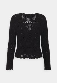 Suéter negro de punto con mangas largas, que presenta un patrón de calados y un dobladillo en forma de ondas. Textura ligera con un diseño ajustado.