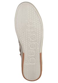 Suola delle scarpe in gomma beige chiaro con un motivo esagonale, testo in rilievo e dettagli marroni. Presenta scanalature e una sezione liscia per una migliore aderenza.