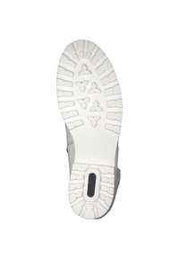 Suela de zapatilla deportiva gris claro con una banda de rodadura de goma blanca que presenta un patrón geométrico y un logotipo de la marca incrustado en el centro.