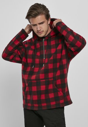 Red and black checkered fleece hoodie with a front pocket, zip neck, adjustable drawstring hood, and relaxed fit.