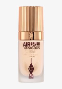 Airbrush Flawless Foundation in a clear glass bottle with a ribbed gold cap. Features elegant typography and decorative accents.