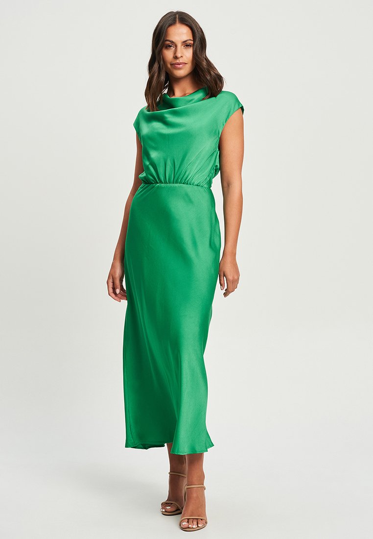 Long green satin dress with cap sleeves and a gathered waist. The fabric has a smooth texture and a sleek, flowing design.