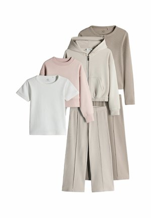 Four women's clothing items in neutral tones: white short-sleeve top, pink cropped sweatshirt, beige zip-up hoodie, and matching wide-leg pants.