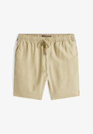 Beige linnen shorts met een elastische tailleband en trekkoord. Voorzien van zijzakken en een losse pasvorm met gestikte zomen.