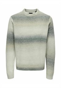 Maglione verde chiaro con scollatura a girocollo, caratterizzato da un motivo a gradiente che va dal verde chiaro a quello scuro. Realizzato in tessuto a maglia testurizzata.